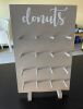 (2) ASSORTED WOODEN TABLE TOP DONUT WALL. HOLDS 16 DONUTS EACH