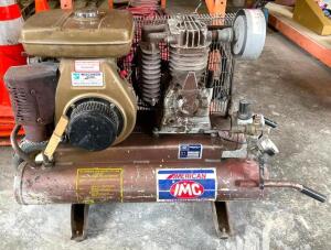 IMC TWIN TANK WHEEL BARROW AIR COMPRESSOR (NEEDS NEW TIRE)