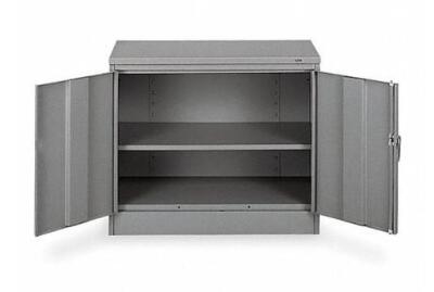 DESCRIPTION: (1) STORAGE CABINET BRAND/MODEL: TENNSCO/1430-GRAY INFORMATION: MEDIUM GRAY/SHELF CAPACITY: 150 LBS RETAIL$: 276.41 SIZE: 30"H X 36"W X 1