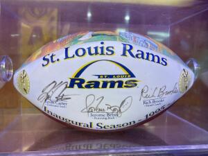 ST. LOUIS RAMS 1995 INAUGURAL SEASON SIGNED FOOTBALL WITH DISPLAY BOX