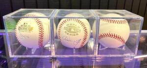 (3) ST. LOUIS CARDINALS SIGNED BASEBALLS (SIGNATURES INCLUDE ADAM WAINWRIGHT, CHRIS CARPENTER, YADIER MOLINA)