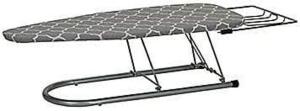 DESCRIPTION: (1) TABLETOP IRONING BOARD WITH IRON REST BRAND/MODEL: HOUSEHOLD ESSENTIALS #133012-1 INFORMATION: SILVER RETAIL$: $42.97 SIZE: 12X30 QTY