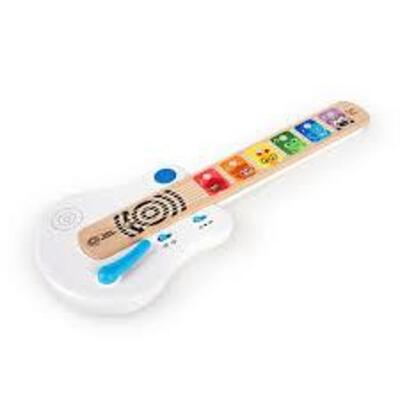 DESCRIPTION: (1) TOY GUITAR BRAND/MODEL: BABY EINSTEIN INFORMATION: WHITE AND WOOD RETAIL$: $30.00 QTY: 1