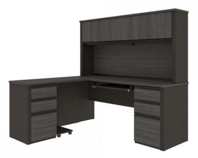 DESCRIPTION: (1) REVERSIBLE L-SHAPED DESK BRAND/MODEL: BESTAR/13493 INFORMATION: BARK GRAY-SLATE/WITH HUTCH/MUST COME INTO INSPECT CONTENTS RETAIL$: 1