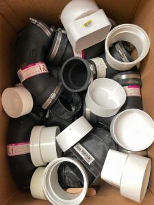 BOX OF ASSORTED RUBBER AND PVC PIPE FITTINGS