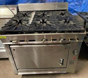 DESCRIPTION: MONTAGUE SIX BURNER GAS RANGE BRAND / MODEL: MONTAGUE ADDITIONAL INFORMATION NATURAL GAS, 20,000 BTU LOCATION: BAY 7 QTY: 1