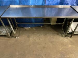 DESCRIPTION: 60" X 24" STAINLESS TABLE W/ 1" BACK SPLASH SIZE: 60" X 24" LOCATION: BAY 7 QTY: 1