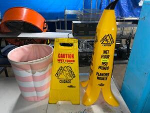 DESCRIPTION: (2) WET FLOOR SIGNS AND (1) CANVAS BASKET. LOCATION: BAY 7 QTY: 1