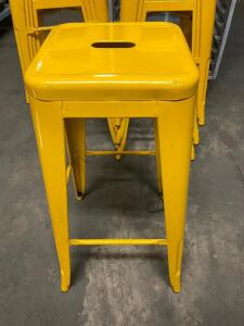 DESCRIPTION: (4) YELLOW BACKLESS BAR STOOLS - METAL LOCATION: BAY 7 THIS LOT IS: SOLD BY THE PIECE QTY: 4