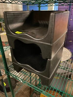 DESCRIPTION: (2) BLACK PLASTIC BOOSTER SEATS. LOCATION: BAY 7 THIS LOT IS: SOLD BY THE PIECE QTY: 2