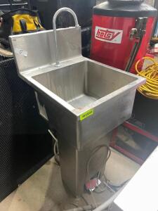 SINGLE WELL STAINLESS PEDESTAL SINK.