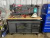 DESCRIPTION: 60" X 24" WOODEN TOPPED WORKBENCH ON CASTERS BRAND/MODEL: HUSKY INFORMATION: HAS ELECTRICAL OUTLETS ON SIDE LOCATION: SHOP QTY: 1 - 2