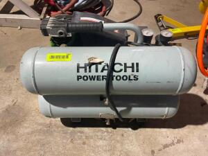 DESCRIPTION: HITACHI 2 HP AIR COMPRESSOR BRAND/MODEL: HITACHI EC12 LOCATION: SHOP QTY: 1