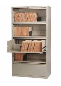 DESCRIPTION: (1) LATERAL FILE CABINET BRAND/MODEL: HIRSH/17453 INFORMATION: PUTTY/5-DRAWERS RETAIL$: 1,015.43 SIZE: 42"W X 67-63/100"H X 18-63/100"D Q