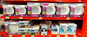 DESCRIPTION: CONTENTS OF SHELF (ASSORTED PHILLIPS RECESSED LIGHTING AND BULBS AS SHOWN) LOCATION: SHOP QTY: 1