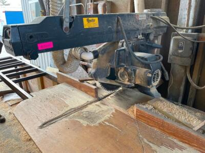 DESCRIPTION: DEWALT 20" RADIAL ARM SAW W/ LEFT AND RIGHT SIDE FEEDER STANDS. BRAND / MODEL: DEWALT 20" ADDITIONAL INFORMATION 3 PHASE. LOCATION: BUILD