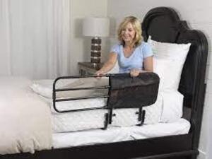 DESCRIPTION: (1) ADJUSTABLE BED RAIL BRAND/MODEL: STANDER INFORMATION: BROWN RETAIL$: $105.00 EA QTY: 1