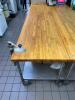 DESCRIPTION: 11' X 30" BUTCHER BLOCK TABLE TOP W/ STAINLESS BASE. ON CASTERS ADDITIONAL INFORMATION W/ MOUNTED CAN OPENER. HEAVY DUTY SIZE 11' X 30" L - 3