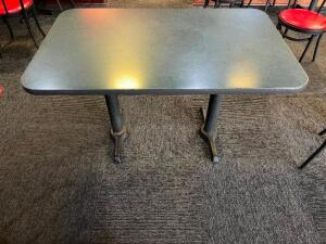 DESCRIPTION: 48" X 30" COMPOSITE TOP TABLE W/ DOUBLE PEDESTAL BASES. SIZE 48" X 30" LOCATION: SEATING QTY: 1