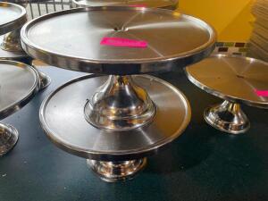 DESCRIPTION: (2) 13" STAINLESS CAKE STAND / PIZZA TRAY STAND SIZE 13" LOCATION: SEATING THIS LOT IS: SOLD BY THE PIECE QTY: 2