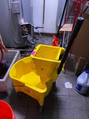 DESCRIPTION: YELLOW MOP BUCKET AND WRINGER ADDITIONAL INFORMATION W/ WET FLOOR SIGN LOCATION: KITCHEN QTY: 1