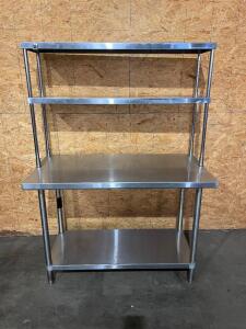 DESCRIPTION: 48" X 24" ALL STAINLESS TABLE W/ TWO TIER RISER SHELF. SIZE: 48" X 24" X 66" LOCATION: 7 QTY: 1