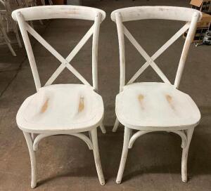DESCRIPTION: (8) WOODEN WHITE CHAIRS W/ DIAGONAL CROSS BACKS LOCATION: 7 THIS LOT IS: SOLD BY THE PIECE QTY: 8