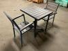 DESCRIPTION: 35.5" X 35.5" TEAK PATIO TABLE W/ METAL FRAME AND (4) TEAK CHAIRS. BRAND / MODEL: EAST COAST CHAIR & BARSTOOL ADDITIONAL INFORMATION RETA - 3