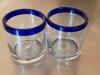 DESCRIPTION: (16) ROUND GLASSES W/ BLUE RIM LOCATION: 7 THIS LOT IS: SOLD BY THE PIECE QTY: 16 - 2