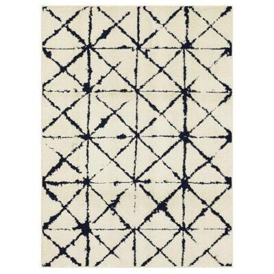 DESCRIPTION: (1) ABSTRACT SHIBORI AREA RUG BRAND/MODEL: GAP HOME/50101 INFORMATION: NAVY & CREAM/MACHINE WOVEN RETAIL$: $99.98 SIZE: 5' X 7' QTY: 1