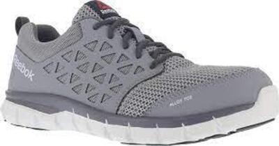 DESCRIPTION: (1) PAIR OF MEN'S ALLOY TOE WORK SHOE BRAND/MODEL: REEBOK INFORMATION: GREY RETAIL$: $104.99 EA SIZE: SIZE 10 QTY: 1