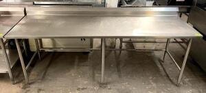 DESCRIPTION: 8' STAINLESS STEEL TABLE WITH BACKSPLASH AND WELDED LEGS SIZE: 96"X30" QTY: 1