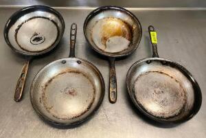 DESCRIPTION: (4) 10.5" FRYING PANS QTY: 4