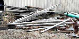 DESCRIPTION: ASSORTED SCRAP WOOD AND LUMBER AS SHOWN LOCATION: FRONT LOT LOCATION: 6249 LORENS LN. CEDAR HILL, MO 63016 QTY: 1