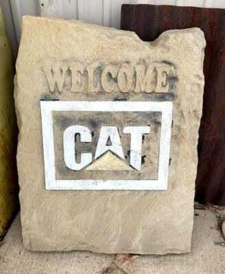 DESCRIPTION: CAT BRANDED WELCOME STONE SIZE: 22"X30" LOCATION: BACK LOT LOCATION: 6249 LORENS LN. CEDAR HILL, MO 63016 QTY: 1