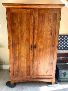 DESCRIPTION: WOODEN MEDIA CABINET INFORMATION: CONTENTS NOT INCLUDED SIZE: 36"X20"X82" LOCATION: HOUSE #2 LOCATION: 6521 WOODLAND DRIVE CEDAR HILL, MO