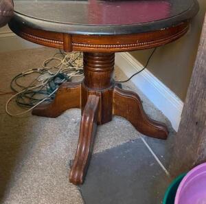 DESCRIPTION: (2) LEATHER TOP WOODEN SIDE TABLE INFORMATION: ONE HAS MORE WEAR - SEE PHOTOS SIZE: 24"X22" LOCATION: HOUSE #2 LOCATION: 6521 WOODLAND DR