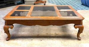 DESCRIPTION: WOODEN/GLASS TOP COFFEE TABLE SIZE: 50"X30"X16" LOCATION: HOUSE #2 LOCATION: 6521 WOODLAND DRIVE CEDAR HILL, MO 63016 QTY: 1