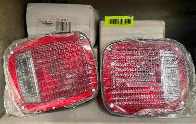 DESCRIPTION: (4) - INCANDESCENT RED/CLEAR TAIL LAMPS LOCATION: SHELVING UNIT #1 THIS LOT IS: SOLD BY THE PIECE QTY: 4