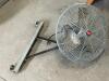 DESCRIPTION: COMMERCIAL STRENGTH GARAGE FAN WITH WALL MOUNT BRAND / MODEL: DAYTON LOCATION: WOOD TABLE / TIRE RACK AREA THIS LOT IS: ONE MONEY QTY: 1 - 3