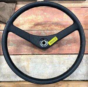 DESCRIPTION: STEERING WHEEL REPLACEMENT LOCATION: WOOD TABLE / TIRE RACK AREA THIS LOT IS: ONE MONEY QTY: 1