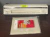 DESCRIPTION: 13" HOT AND COLD 4-ROLLER POUCH LAMINATOR WITH EXTRA POUCHES THIS LOT IS: ONE MONEY QTY: 1 - 2