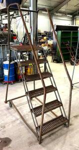 DESCRIPTION: 6-STEP METAL STEP LADDER INFORMATION: HAS BACK WHEELS SIZE: 56"X24" QTY: 1