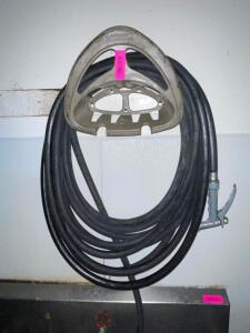 NSF GARDEN HOSE W/ WALL MOUNTED REEL.