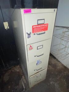 FOUR DRAWER METAL FILE CABINET.