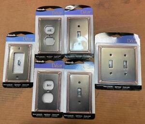 DESCRIPTION: (6) ASSORTED OUTLET/SWITCH CAST METAL WALL PLATES IN AGED BRONZE BRAND/MODEL: AMERELLE QTY: 6