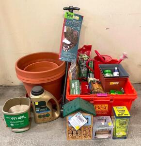 DESCRIPTION: LARGE ASSORTMENT OF GARDENING SUPPLIES AS SHOWN (PLANTERS, SPREADER, GRASS SEED, GARDEN STAPLES, INSECT TRAPS, PLANT FOOD, SEED STARTERS,