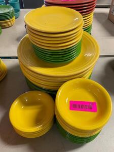 (12) 10.5" ASSORTED GREEN AND YELLOW CERAMIC DINNER PLATES AND MATCHING BOWLS.