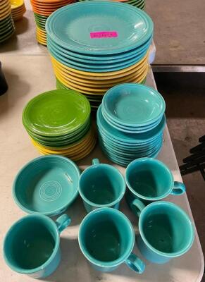 (18) 10.5" ASSORTED GREEN, BLUE, AND YELLOW CERAMIC DINNER PLATES AND MATCHING BOWLS.