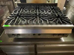 DESCRIPTION: WOLF SIX BURNER COUNTER TOP GAS RANGE. BRAND / MODEL: WOLF. ADDITIONAL INFORMATION COMES WITH REGULATOR SIZE: 36" QTY: 1